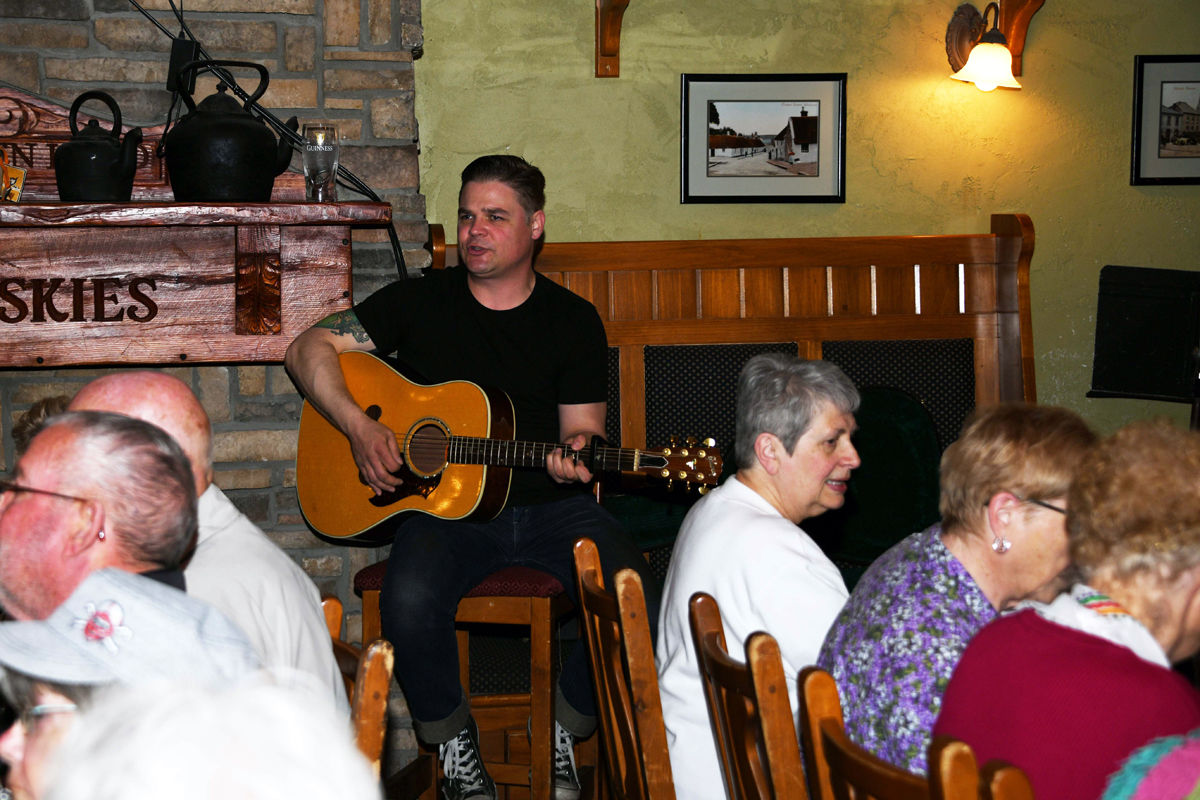 008 The Fun Club was entertained with traditional Irish tunes during lunch.JPG